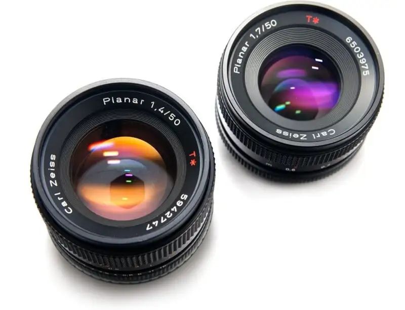 Two Carl Zeiss camera lenses, labeled